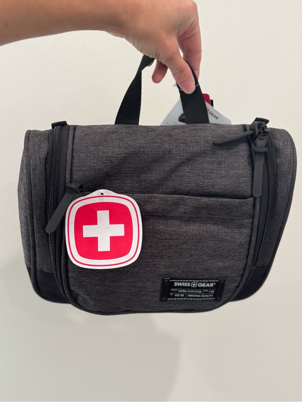 SwissGear Charcoal Gray Men’s Toiletry Kit with Red Logo Accent